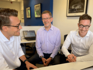 sales team discuss what is an erp project